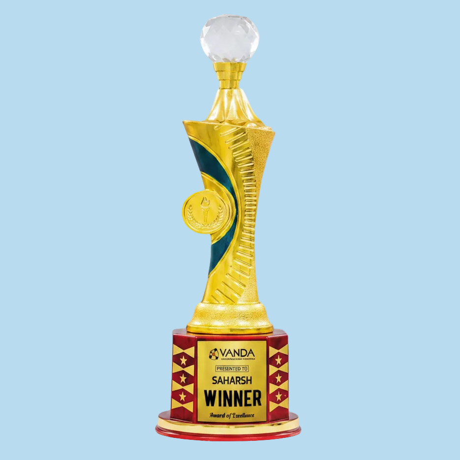Trophy with yellow and red design, featuring the word 'Winner' and 'VANDA' branding.