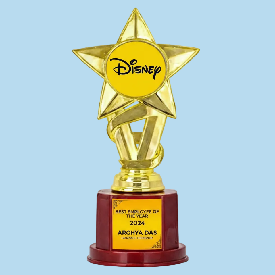 Gold star-shaped trophy with Disney logo and 'Best Employee of the Year 2024' text on a red base.